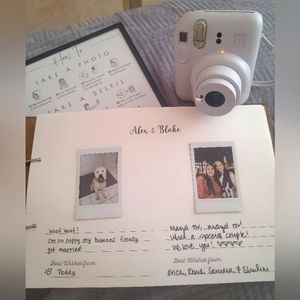 Instax Mini 12 Camera and Instructional Sign